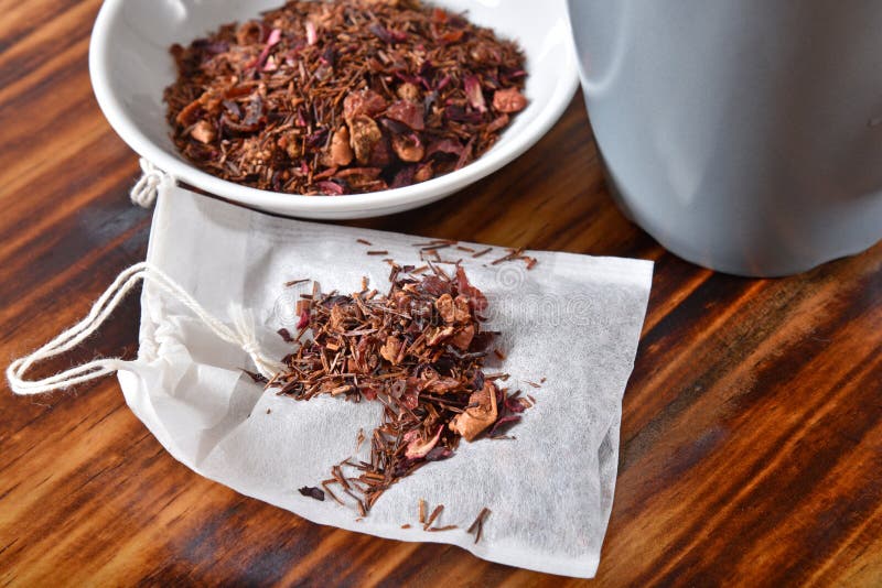 Strawberry kiwi infused rooibos tea on a teabag. Strawberry kiwi infused rooibos tea on a teabag