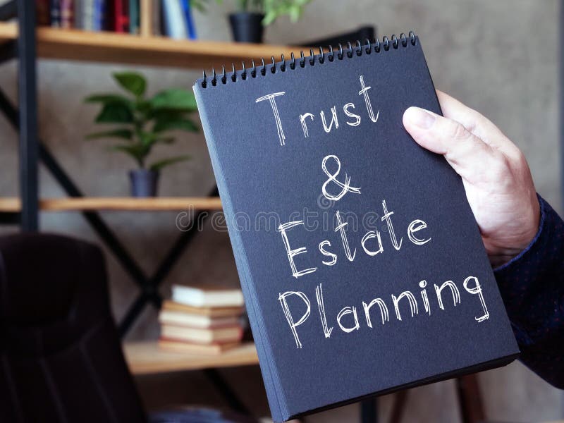 Trust and Estate Planning is shown on the conceptual business photo stock photo
