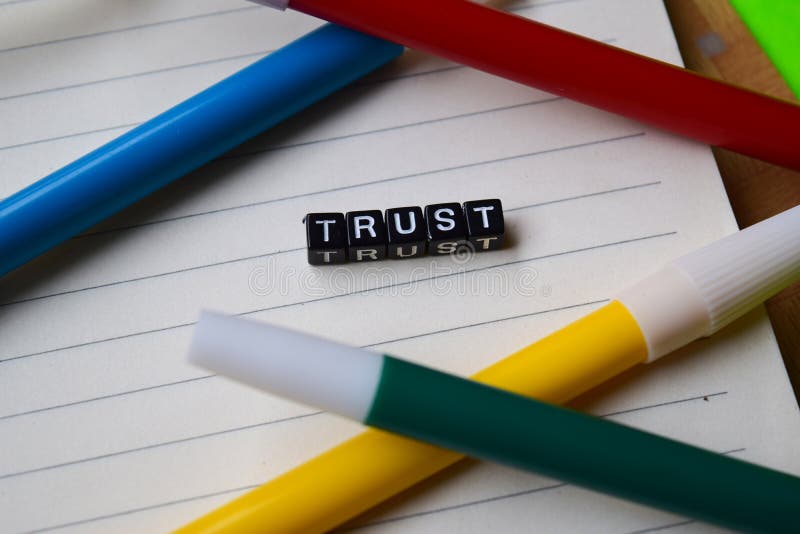 Trust message written on wooden blocks. education and motivation concepts. stock photo Trust message written on wooden blocks. education and motivation concepts. stock photo