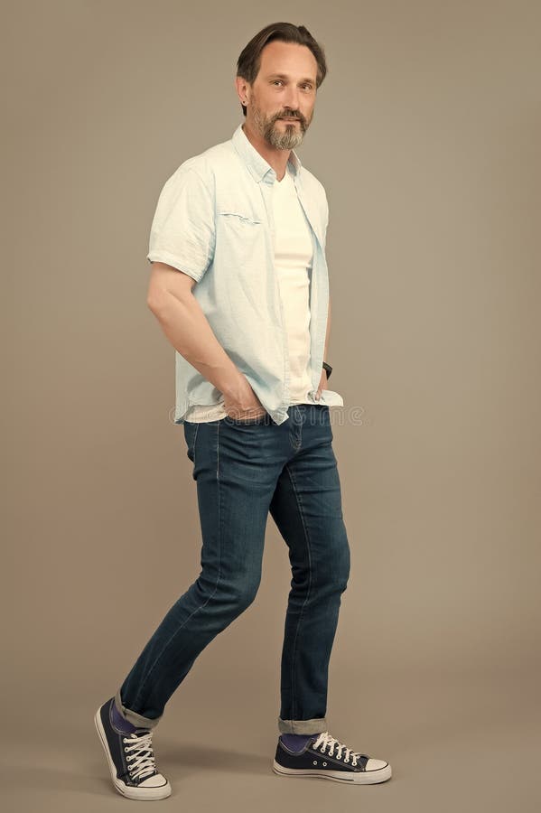 Try to look younger. Mature person wear modern stylish clothes for youth. Hipster guy. Stylish hipster with beard stock images