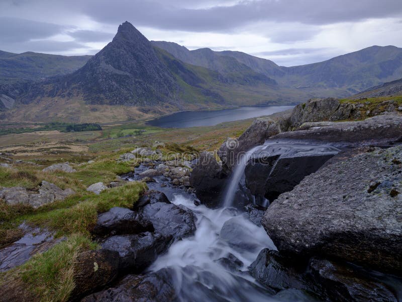 Tryfan in spring with the Afon Lloer in flow over the waterfalls, Wales stock image Tryfan in spring with the Afon Lloer in flow over the waterfalls, Wales stock image