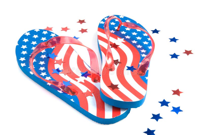 Pair of American flag flip flops with star confetti. Pair of American flag flip flops with star confetti