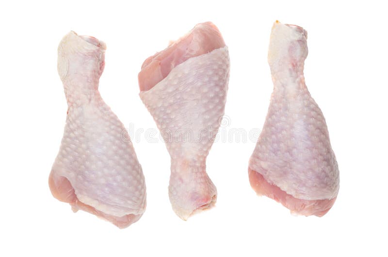 Trzy surowej kurczak nogi odizolowywającej na białym tle fotografia stock Trzy surowej kurczak nogi odizolowywającej na białym tle fotografia stock