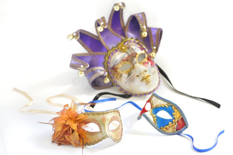 Three Venetian masks for a party on a white background. Three Venetian masks for a party on a white background