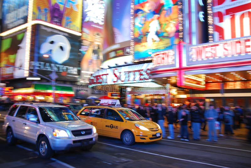 Broadway, Times Square busy traffic, new york city, with yellow cab, advertisement. Broadway, Times Square busy traffic, new york city, with yellow cab, advertisement.