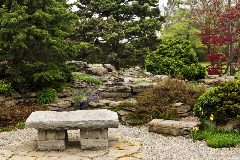 Japanese zen garden with natural stone bench. Japanese zen garden with natural stone bench