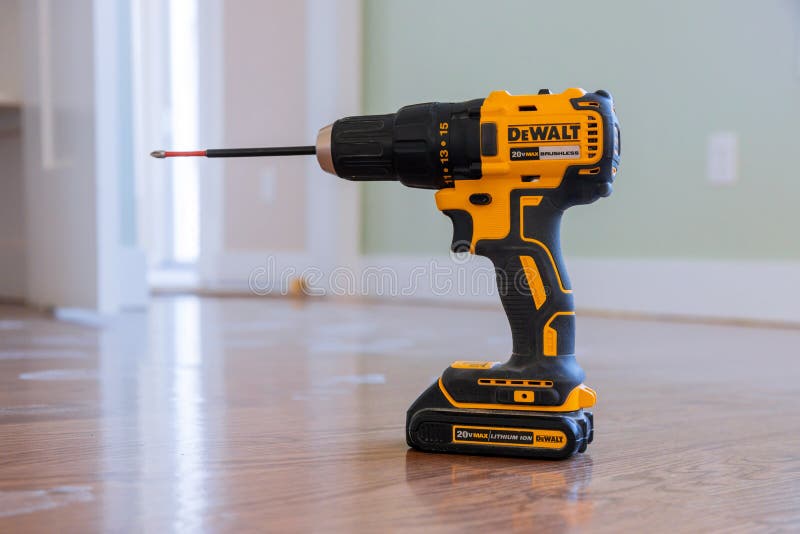 New York NY NOV 21 2019: Cordless Drill Drivers DeWalt a wooden table for home improvements to a kitchen wall, screwdriver, tool, equipment, work, construction, instrument, object, power, electric, black, battery, yellow, industry, industrial, metal, technology, machine, hardware, steel, single, diy, repair, professional, service, device, tools, woodwork, case, manual, drilling, illustrative, editorial, handyman, household, handicrafts. New York NY NOV 21 2019: Cordless Drill Drivers DeWalt a wooden table for home improvements to a kitchen wall, screwdriver, tool, equipment, work, construction, instrument, object, power, electric, black, battery, yellow, industry, industrial, metal, technology, machine, hardware, steel, single, diy, repair, professional, service, device, tools, woodwork, case, manual, drilling, illustrative, editorial, handyman, household, handicrafts