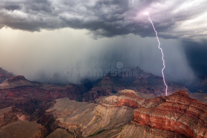 A lightning bolt strikes inside the Grand Canyon as a strong monsoon thunderstorm moves through Grand Canyon National Park, Arizona. A lightning bolt strikes inside the Grand Canyon as a strong monsoon thunderstorm moves through Grand Canyon National Park, Arizona.