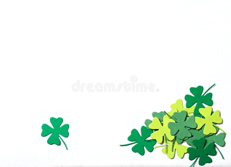 St. Patrick's Day party favor shamrocks on a white background. St. Patrick's Day party favor shamrocks on a white background