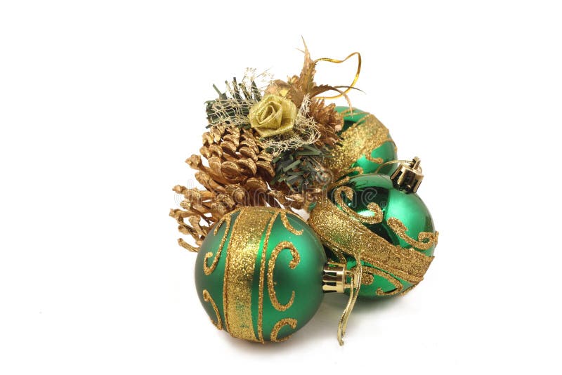 Três brinquedos do Natal e colisões do ouro fotografia de stock