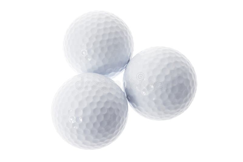 Três esferas de golfe