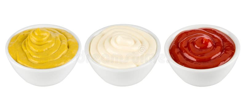 Ketchup, mustard and mayonnaise in ceramic bowles. Ketchup, mustard and mayonnaise in ceramic bowles