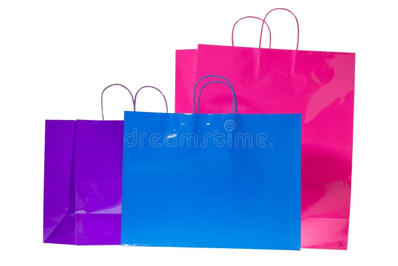 Três sacos coloridos do presente fotografia de stock royalty free Três sacos coloridos do presente fotografia de stock royalty free