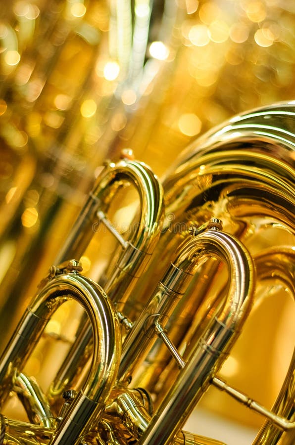 Golden brass instrument detail tuba. Golden brass instrument detail tuba