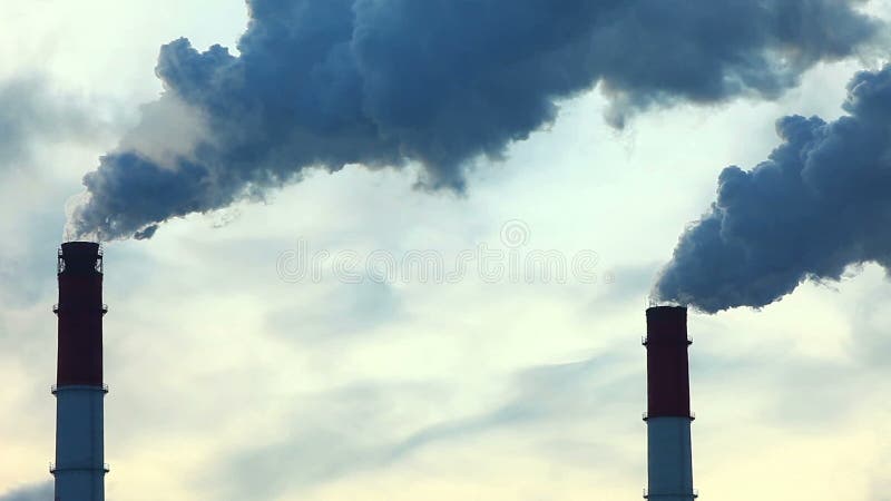 Tube generate smoke at winter sunset in russia