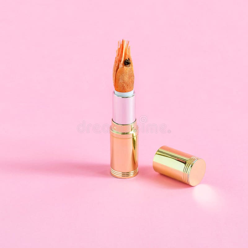 Creative idea: tube of lipstick and shrimp stock image Creative idea: tube of lipstick and shrimp stock image