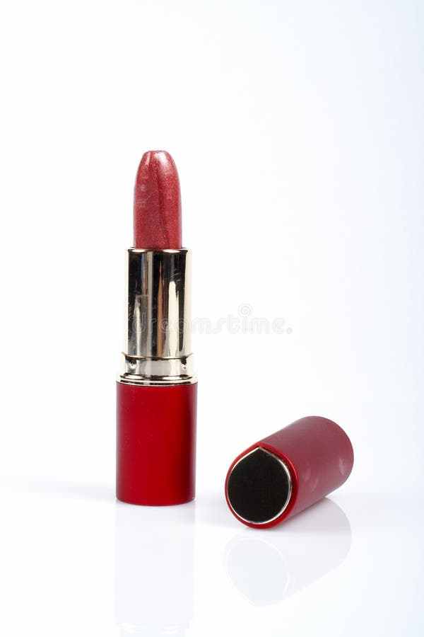 Tube of red lipstick stock image. Image of facial, color 876611