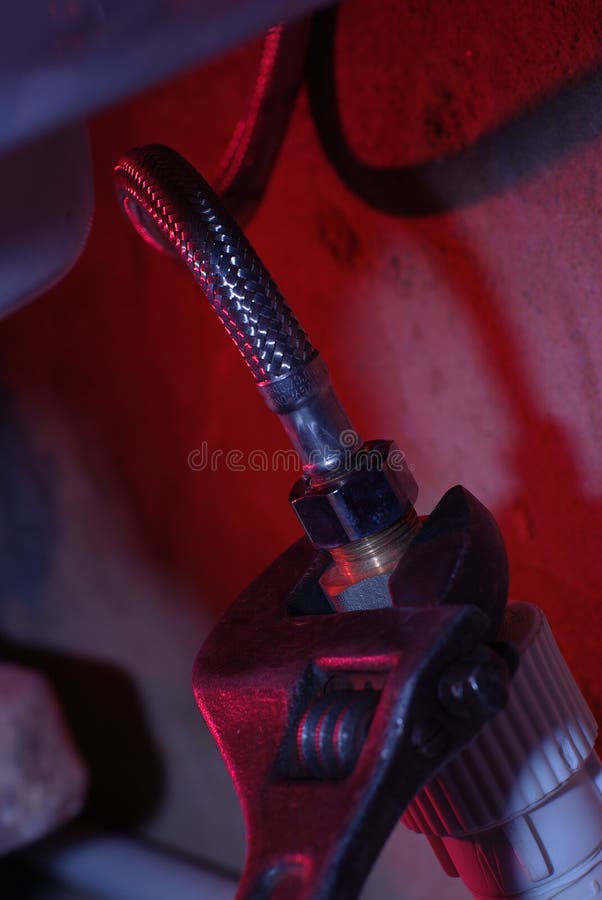 Tubing with iron wrench stock photo. Image of hosepipe 19785126