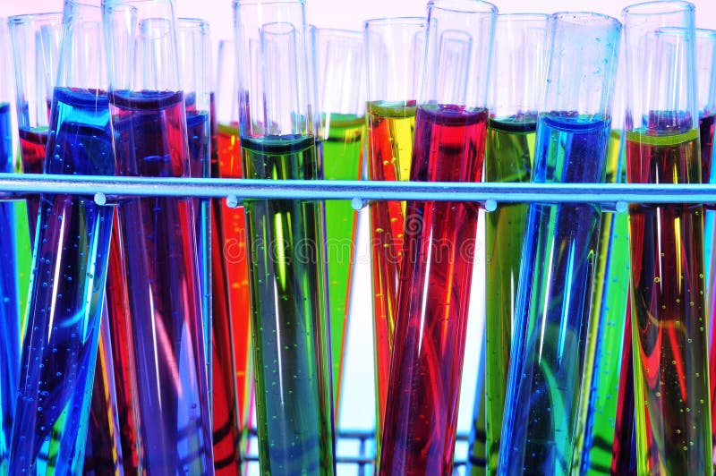 Closeup of a pile of test tubes with liquids of different colors. Closeup of a pile of test tubes with liquids of different colors