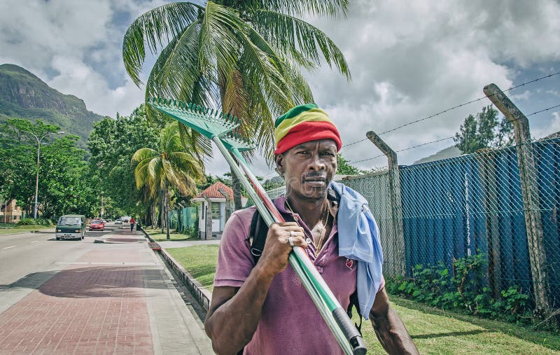 An aboriginal creole man is going on work, Victoria, Seychelles. An aboriginal creole man is going on work, Victoria, Seychelles