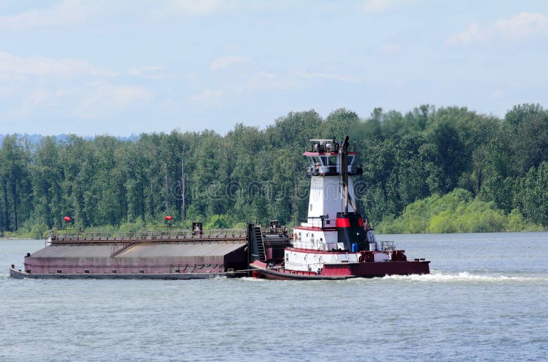 Tugboat Pushing A Heavy Barge Stock Photo - Image of haul ... Tugboat Pushing A Heavy Barge Stock Photo - Image of haul ...