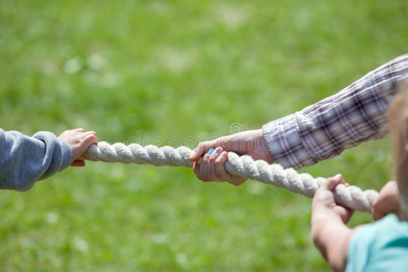 Tug Of War; Hands Pulling A Rope Stock Image Image of competition
