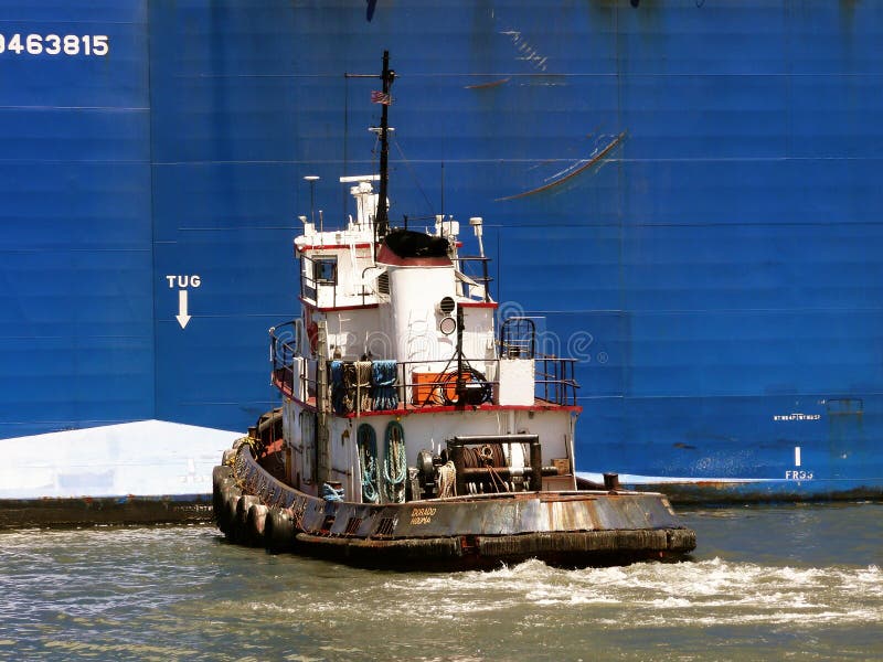 Tugboat and Supply Ship editorial stock image. Image of nautical