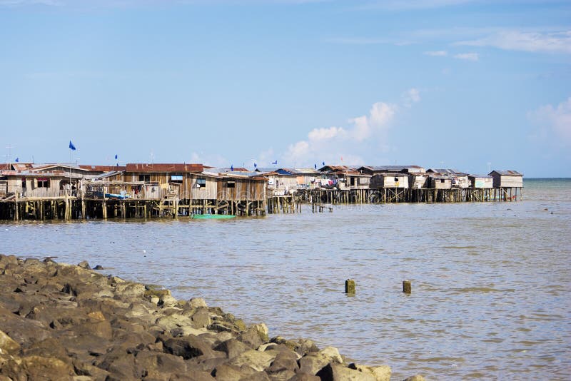 Image of coastal slums located at Tawau, Malaysia. Image of coastal slums located at Tawau, Malaysia.