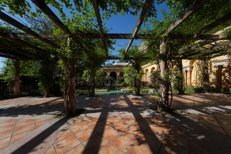 Spanish style andalucian garden patio in a Mediterranean villa. Spanish style andalucian garden patio in a Mediterranean villa