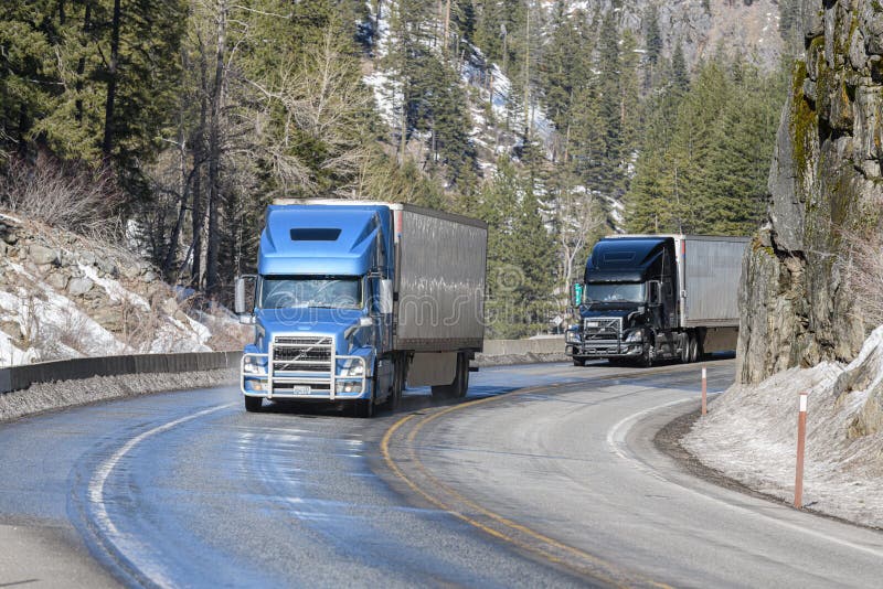 Trucks passing east through Tumwater Canyon in Washington State