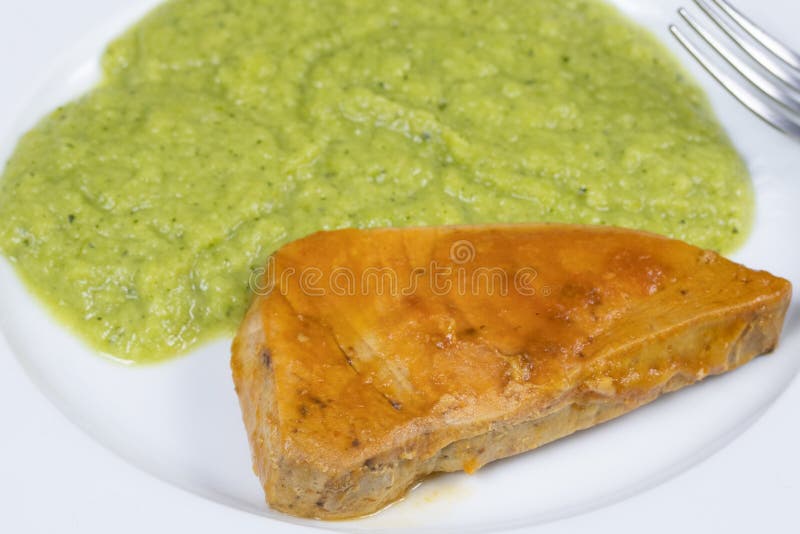 Tuna steak and green puree stock photo. Image of plate 167325508