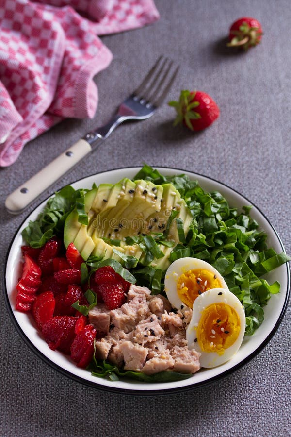 Tuna Strawberries Avocado Egg and Spinach Salad. Tuna Fish Salad. Stock