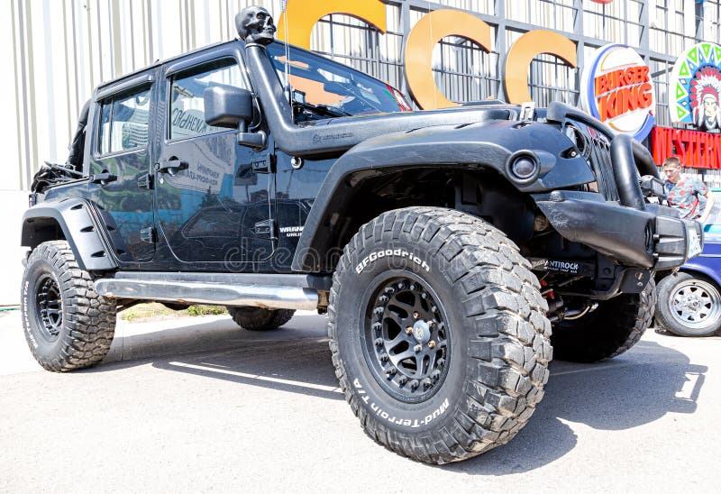 Tuned Jeep Wrangler Vehicle with All Terrain Tires Editorial Photography -  Image of power, tour: 219960507