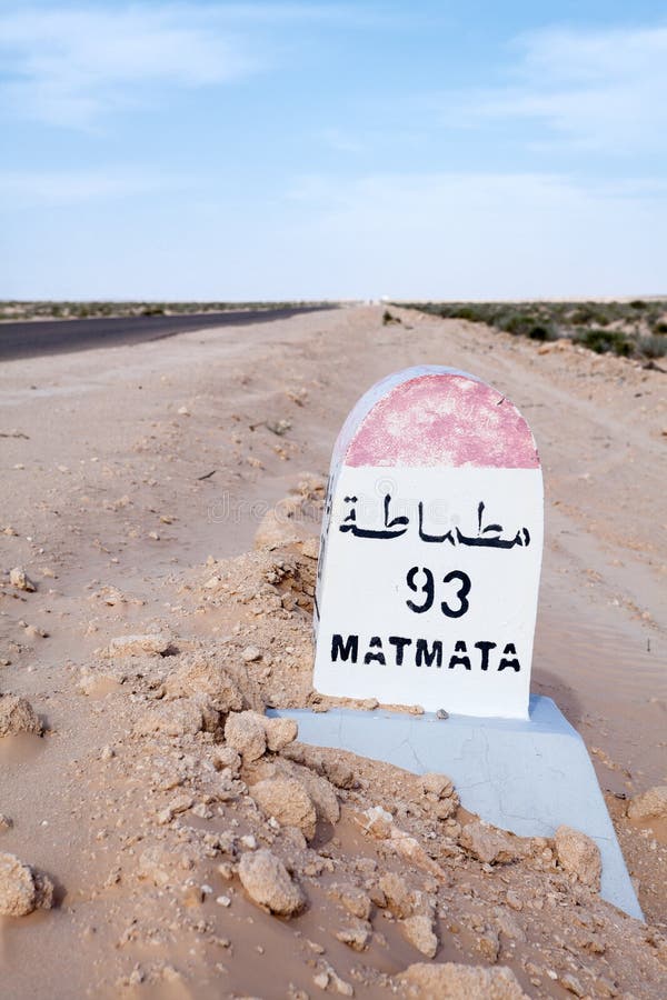 Tunisia, Milepost on a desert road to the Matmata destination, Tunisia, Africa. Road passing through the salt lake Chott El Djerid