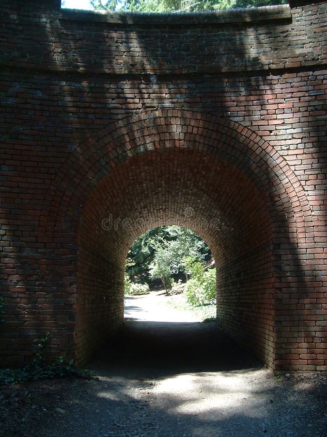 Tunnel in Bricks stock photo. Image of road, walk, walkway 555888
