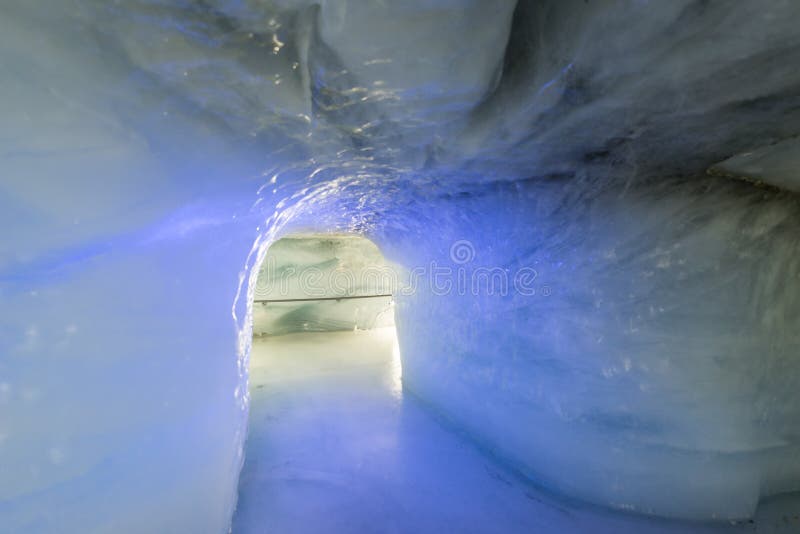 Ice tunnel in the Aletsch Glacier at Jungfraujoch, Switzerland. Jungfraujoch is an underground railway station situated below the Jungfraujoch col in the Bernese Oberland region of Switzerland. At 3,454 meters (11,332 ft) above sea level, this is the highest railway station in Europe, and is close to the summits of the Eiger, Jungfrau and Mönch mountains.[. Ice tunnel in the Aletsch Glacier at Jungfraujoch, Switzerland. Jungfraujoch is an underground railway station situated below the Jungfraujoch col in the Bernese Oberland region of Switzerland. At 3,454 meters (11,332 ft) above sea level, this is the highest railway station in Europe, and is close to the summits of the Eiger, Jungfrau and Mönch mountains.[