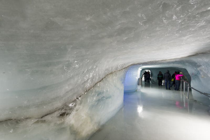 Ice tunnel in the Aletsch Glacier at Jungfraujoch, Switzerland. Jungfraujoch is an underground railway station situated below the Jungfraujoch col in the Bernese Oberland region of Switzerland. At 3,454 meters (11,332 ft) above sea level, this is the highest railway station in Europe, and is close to the summits of the Eiger, Jungfrau and Mönch mountains.[. Ice tunnel in the Aletsch Glacier at Jungfraujoch, Switzerland. Jungfraujoch is an underground railway station situated below the Jungfraujoch col in the Bernese Oberland region of Switzerland. At 3,454 meters (11,332 ft) above sea level, this is the highest railway station in Europe, and is close to the summits of the Eiger, Jungfrau and Mönch mountains.[