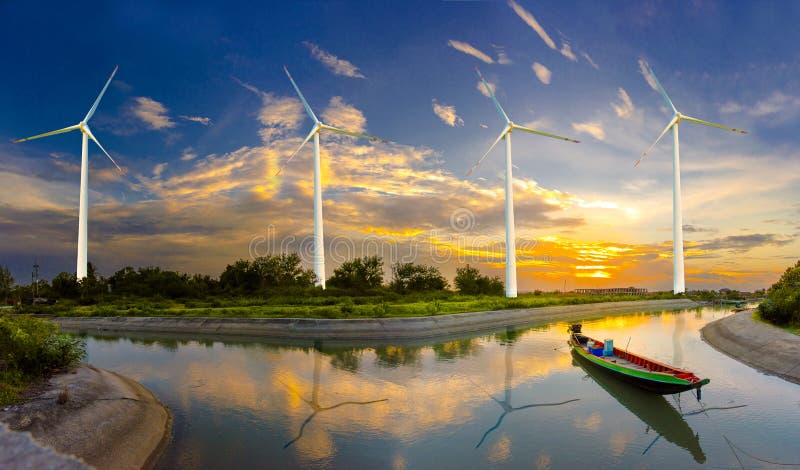 A turbina eólica ou as energias eólicas traduzida na eletricidade, proteção ambiental fazem o mundo não quente imagem de stock A turbina eólica ou as energias eólicas traduzida na eletricidade, proteção ambiental fazem o mundo não quente imagem de stock