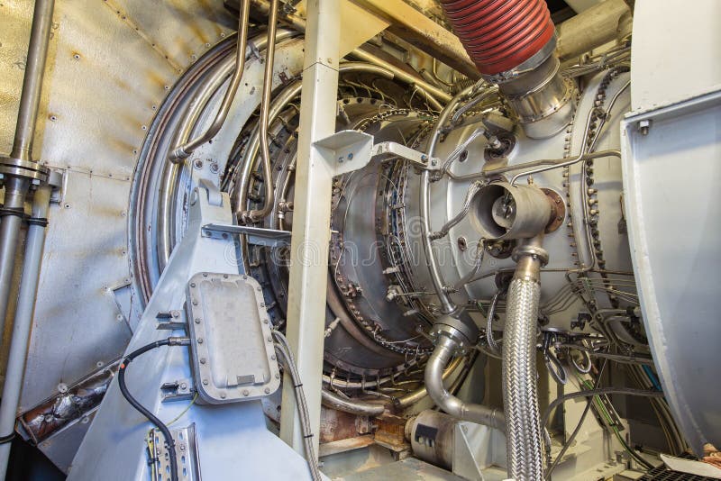 Turbina a gas del compressore dell'alimentazione dentro la recinzione immagine stock libera da diritti Turbina a gas del compressore dell'alimentazione dentro la recinzione immagine stock libera da diritti