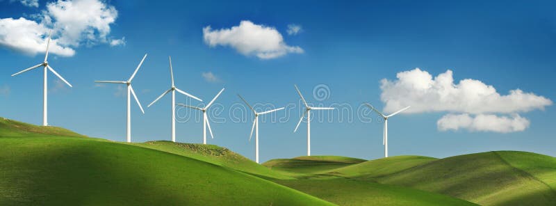 Turbinas de viento en las colinas verdes fotografía de archivo libre de regalías Turbinas de viento en las colinas verdes fotografía de archivo libre de regalías