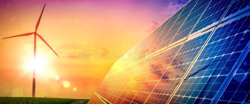 Turbine eoliche e pannelli solari al tramonto