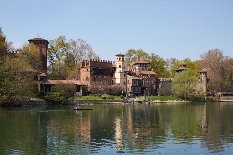 Borgo medievale, medieval village and castle with Po river in a sunny day, clear blue sky in Turin
