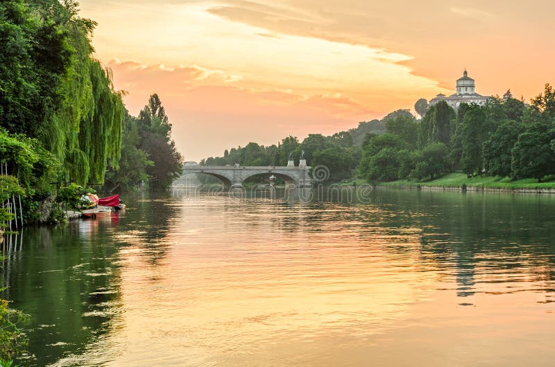 Turin (Torino), river Po, Monte dei Cappuccini and hills at sunrise. Turin (Torino), river Po, Monte dei Cappuccini and hills at sunrise