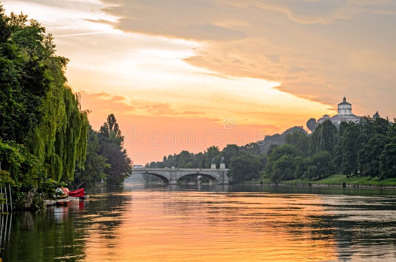 Turin (Torino), river Po and Monte dei Cappuccini and hills at sunrise. Turin (Torino), river Po and Monte dei Cappuccini and hills at sunrise