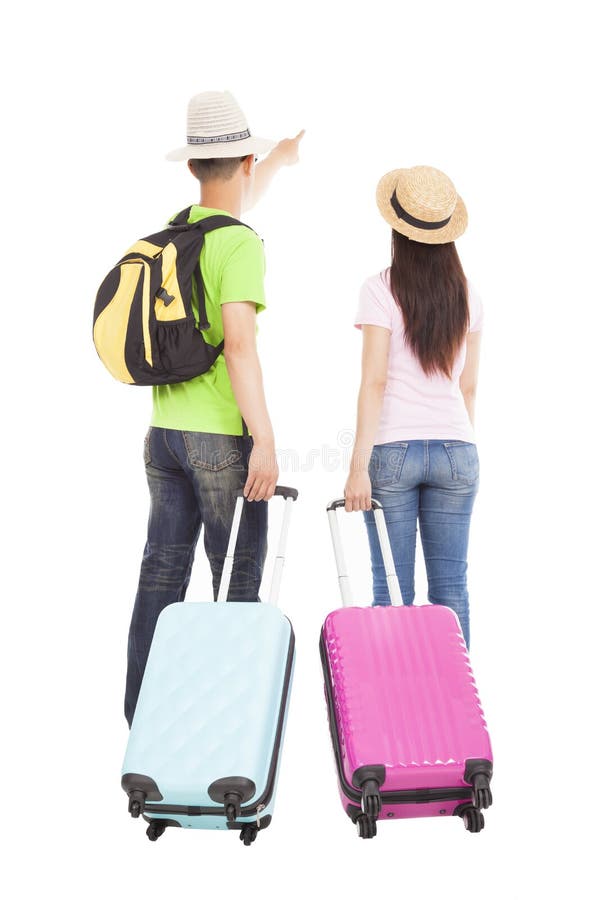Turista joven de los pares con la maleta del viaje fotos de archivo libres de regalías Turista joven de los pares con la maleta del viaje fotos de archivo libres de regalías