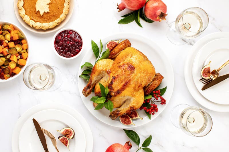 Turkey or chicken served with light white wine for festive dinner, top down view stock photos