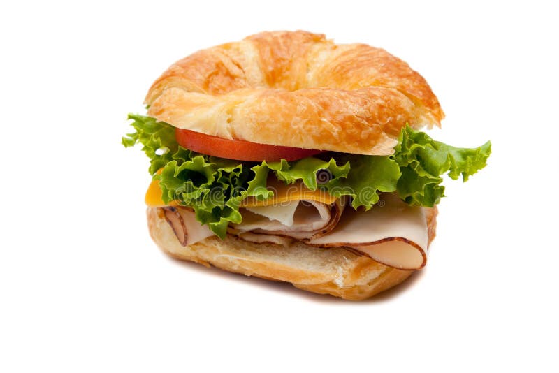A turkey sandwich on a croissant