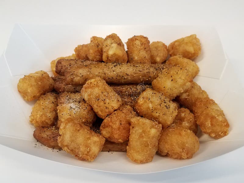 Turkey Sausage and Potatoes with Salt and Pepper in Container Stock