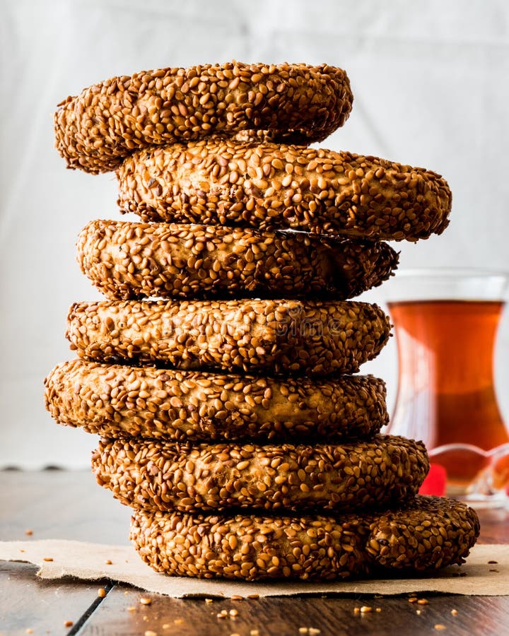 Turkish Bagel Kandil simiti with tea stack of pastry stock photos
