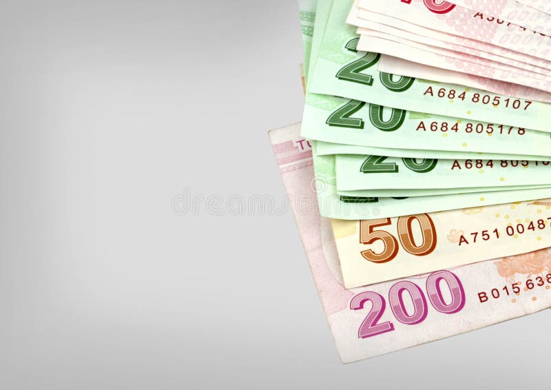 Turkish banknotes. Turkish Lira ( TL ) on grey background stock photo Turkish banknotes. Turkish Lira ( TL ) on grey background stock photo